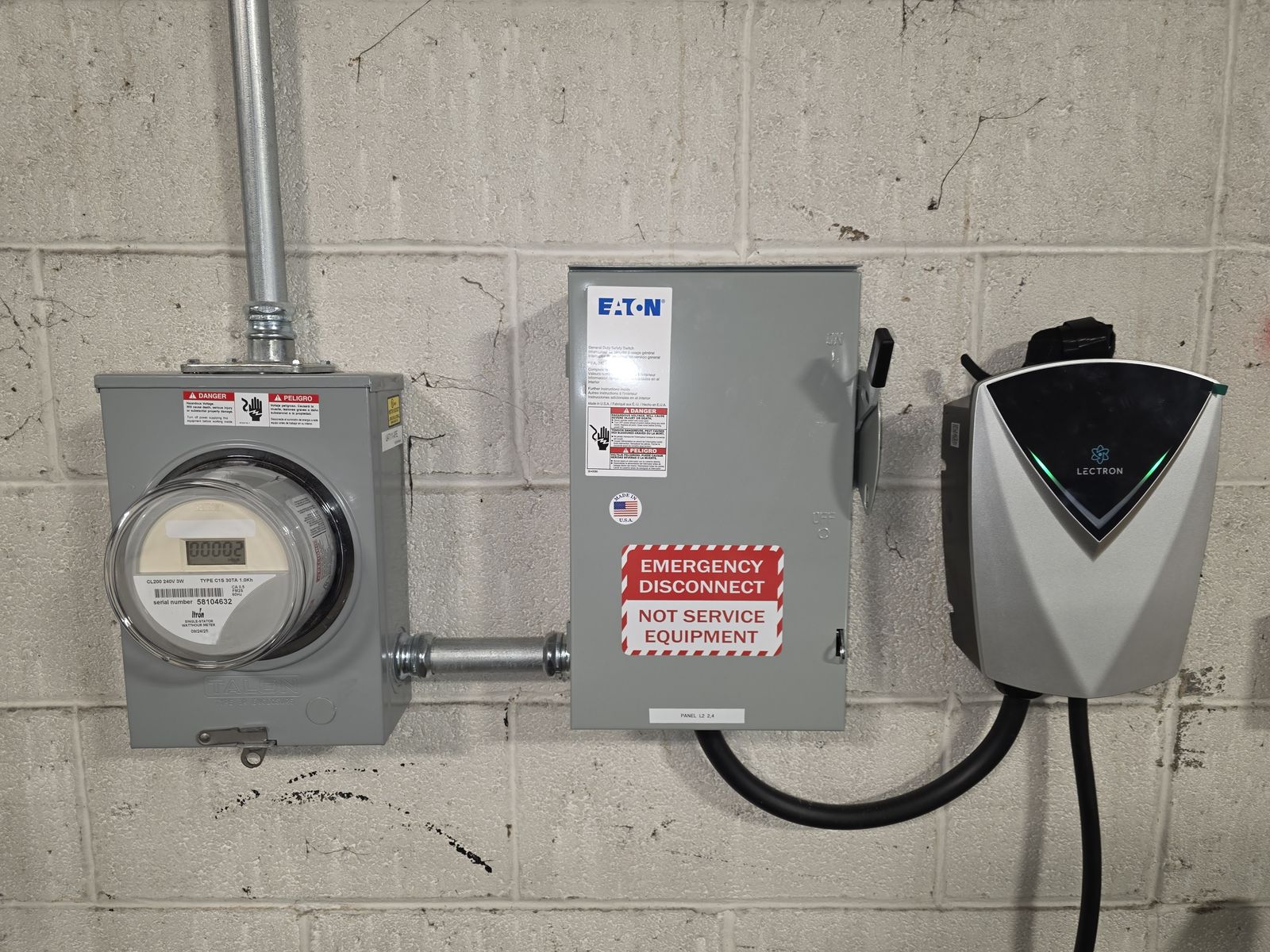 Meter, disconnect, and Lectron EV charger installation